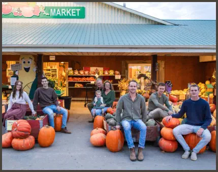 Zekveld Family in front of the store